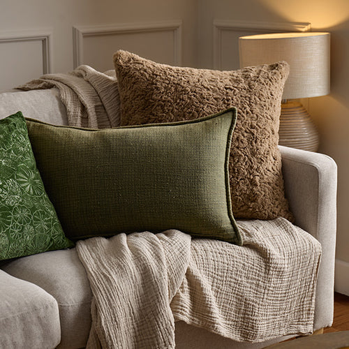 collection of Autumn inspired cushions, throws and bedding