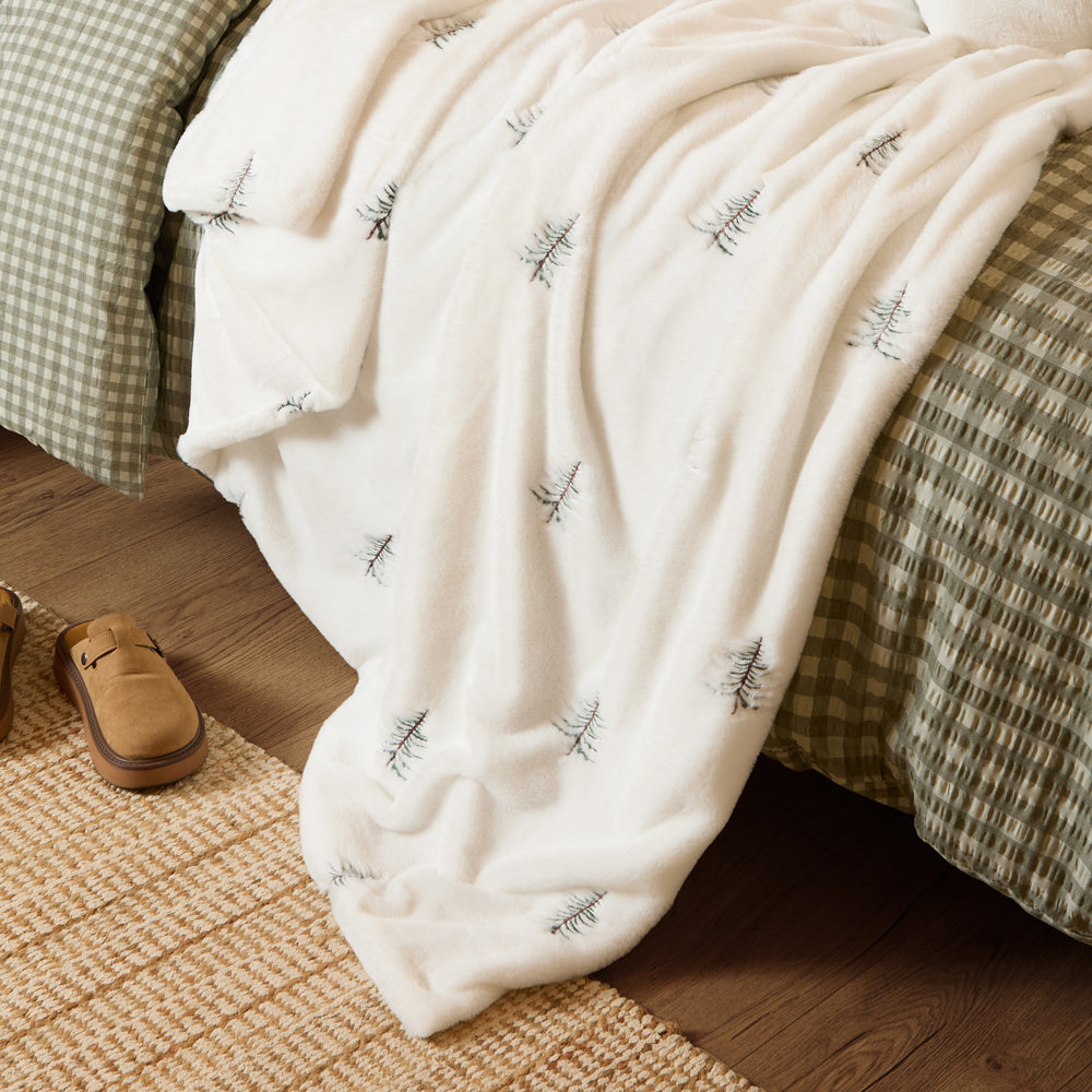 Winter Pines Faux Fur Throws Ecru