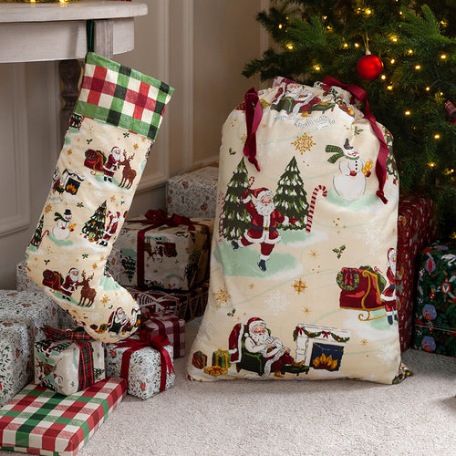 Christmas stocking and sack surrounded by gifts.